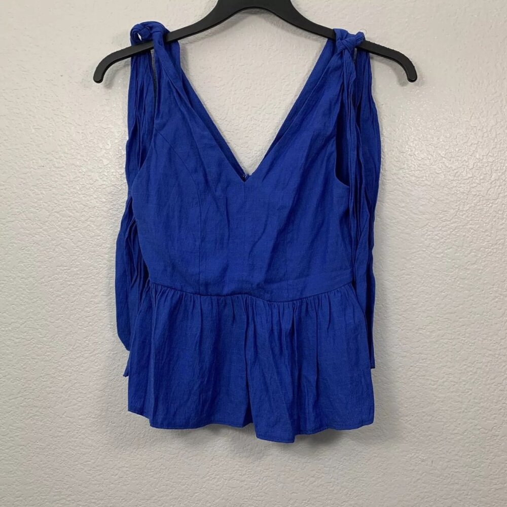 The Impeccable Pig Sleeveless Tie Shoulder Peplum Top